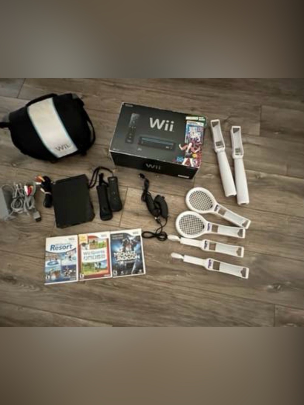 Nintendo Wii Bundle with ImOriginal Box, Carrying Case,  Accessories and 4 DVDs